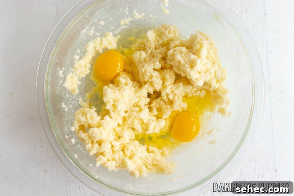 Soft Lime Sugar Cookies with Zesty Citrus Glaze 6 eggs added to bowl