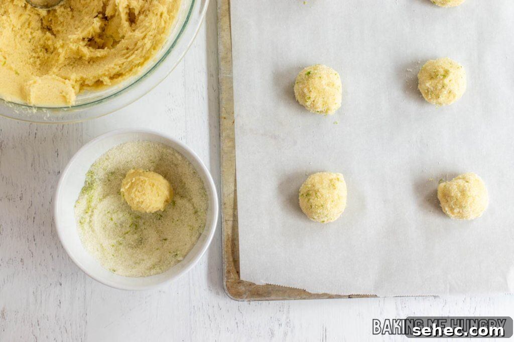 Soft Lime Sugar Cookies with Zesty Citrus Glaze 9 cookie dough being rolled in sugar and zest mixture