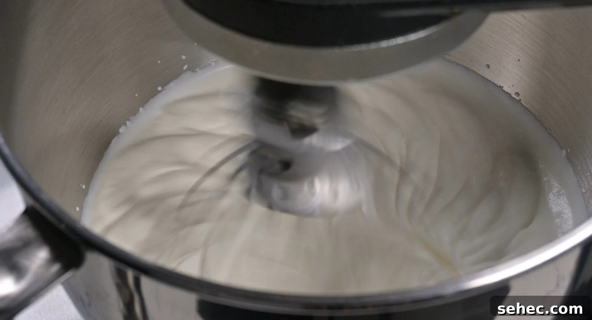 Risalamande Danish Rice Pudding with Almonds 12 Whipping cream in a mixer.