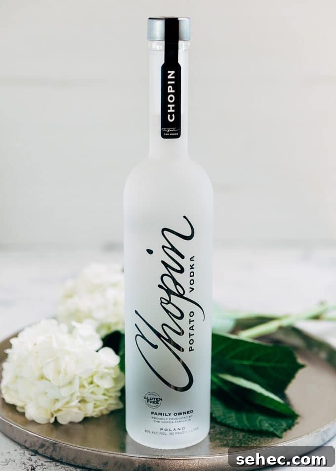 Chopin Spring Equinox Vodka Cocktail Recipe 3 chopin potato vodka on a tray with hydrangea