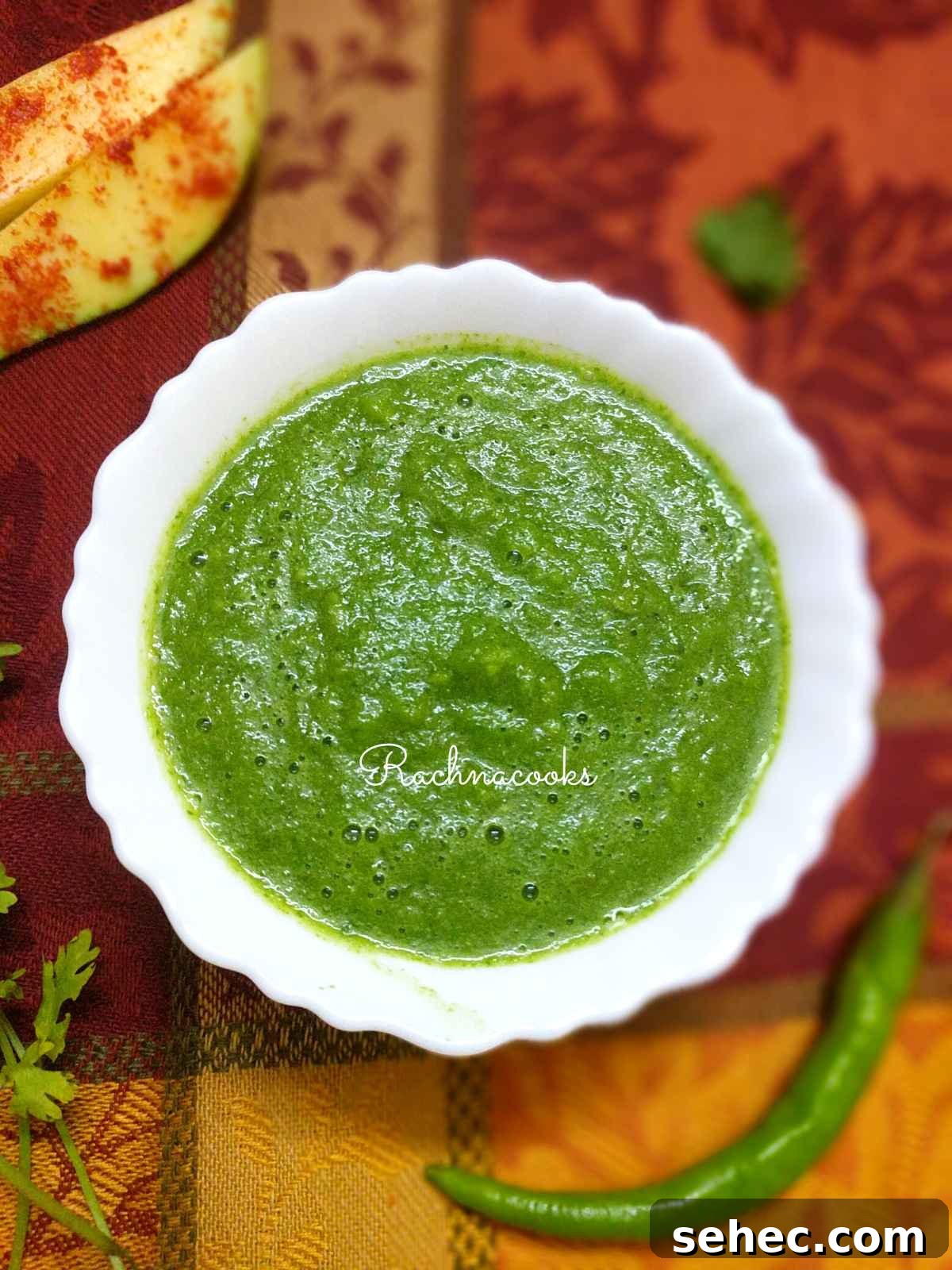 green mango chutney in a white bowl