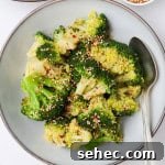 Korean broccoli served in a bowl with a spoon.