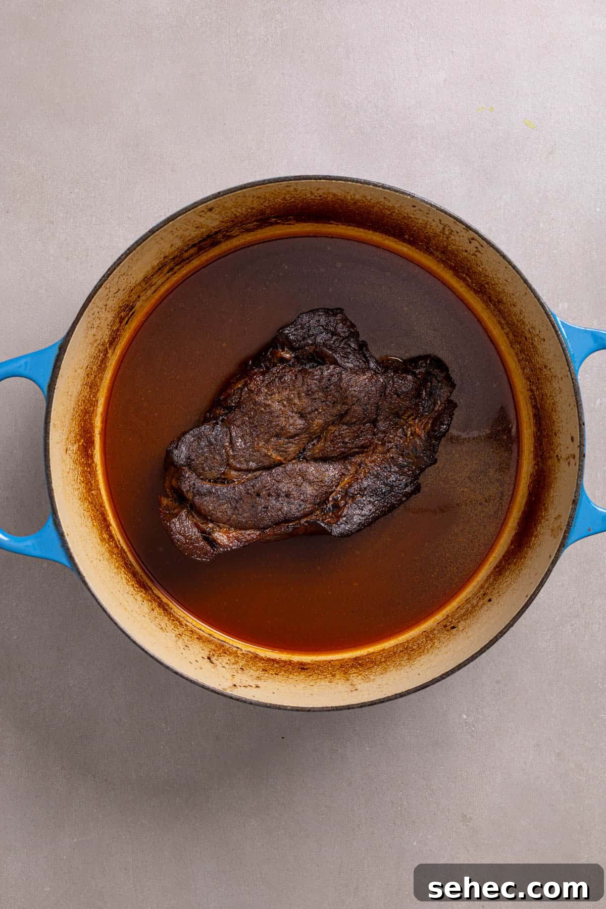 Citrus Soy Braised Chuck Roast Recipe 6 A Dutch oven with braised chuck roast whole.