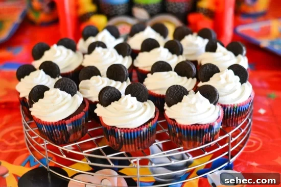 DIY Glitter Slime Party Favors for Kids 4 Easy Mickey Mouse Cupcakes, Disney Party, Disney Party Food