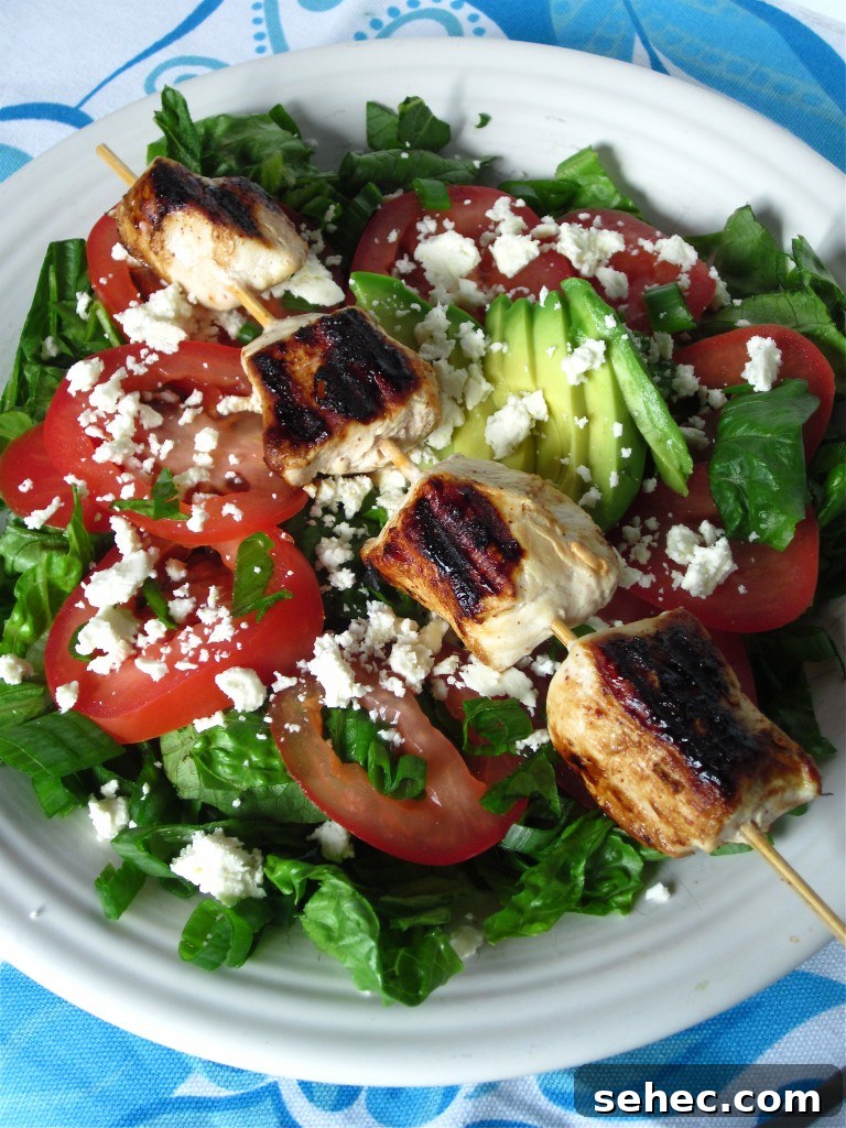 Chicken Kebab Salad with Cucumber and Yogurt Dressing 4 Fresh salad with feta avocado and tomatoes
