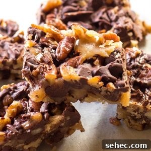 Chocolate Toffee Buttercrunch Candy Recipe 9 Chocolate Toffee Buttercrunch - toffee, nuts, and chocolate and so easy to make! the-girl-who-ate-everything.com