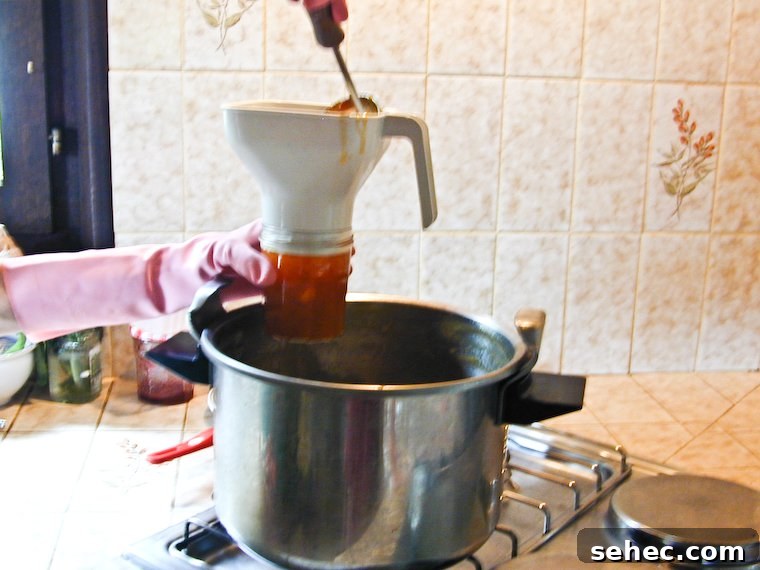 Homemade Apricot Almond Jam Recipe 13 Pouring