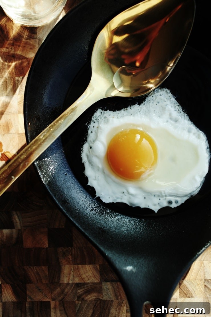 How to Fry an Egg Perfectly Every Time 4 Sunny-Side up egg in cast iron skillet
