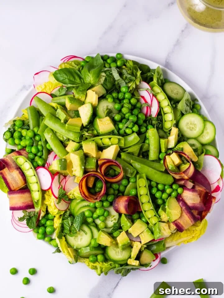 Spring Pea Salad with Lemon Mint Vinaigrette 8 snap peas, fresh herbs, english peas, carrot, radish and cucumbers added to the lettuce
