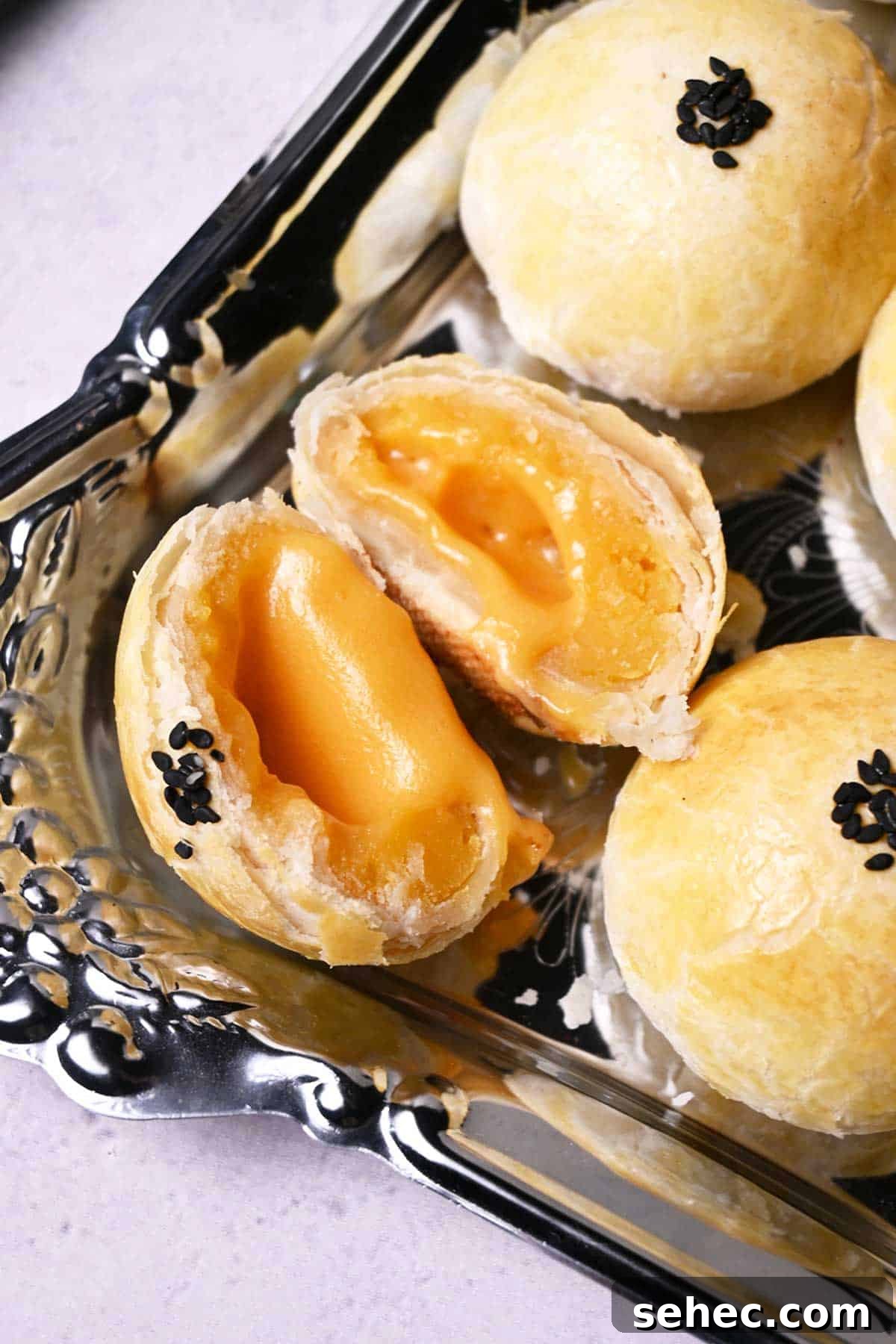 Thousand Layer Lava Custard Mooncakes Recipe 7 freshly baked thousand layers lava custard mooncakes with flaky pastry