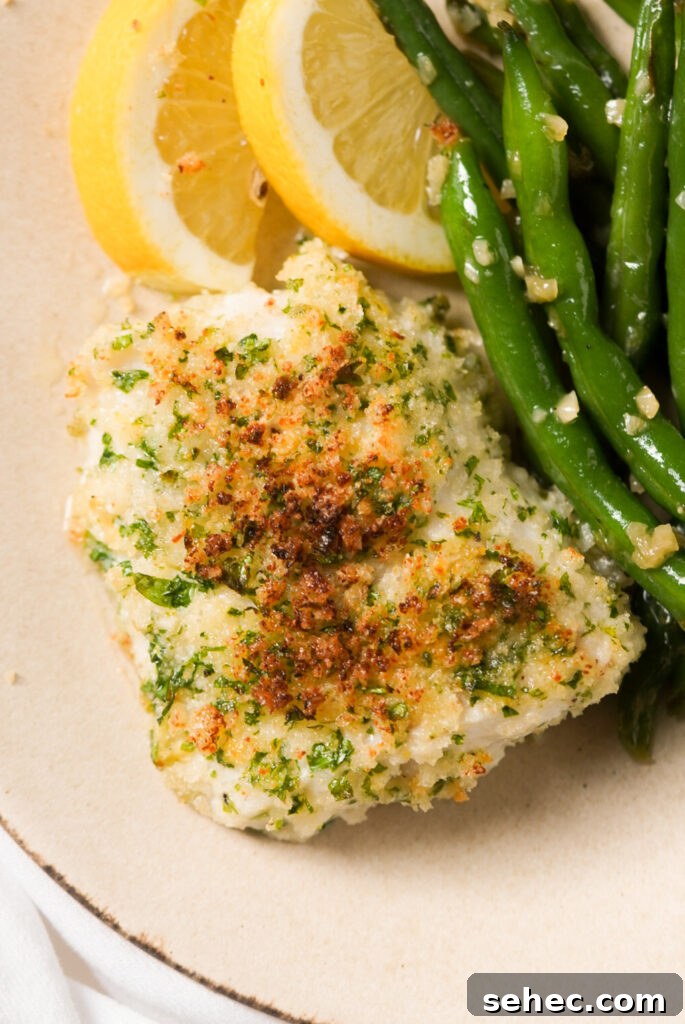Parmesan Crusted Baked Cod Recipe 11 baked cod filet with green beans on the side