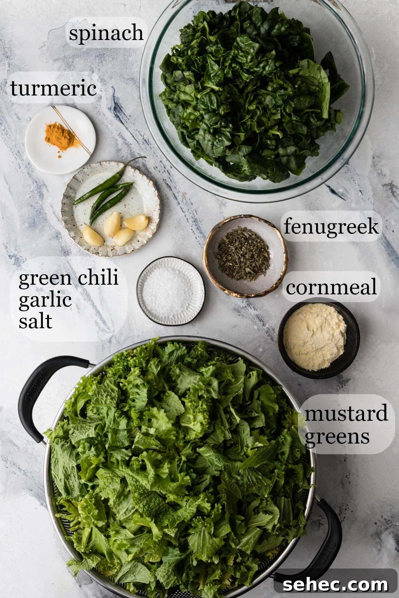 Sarson Ka Saag Recipe Stovetop and Instant Pot 4 Marbled backdrop with ingredients for making Instant Pot Sarson Ka Saag