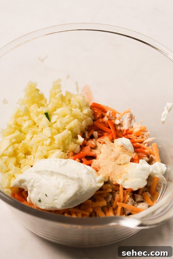 Buffalo Chicken Zucchini Boats Recipe 7 buffalo chicken mixture ingredients in a mixing bowl