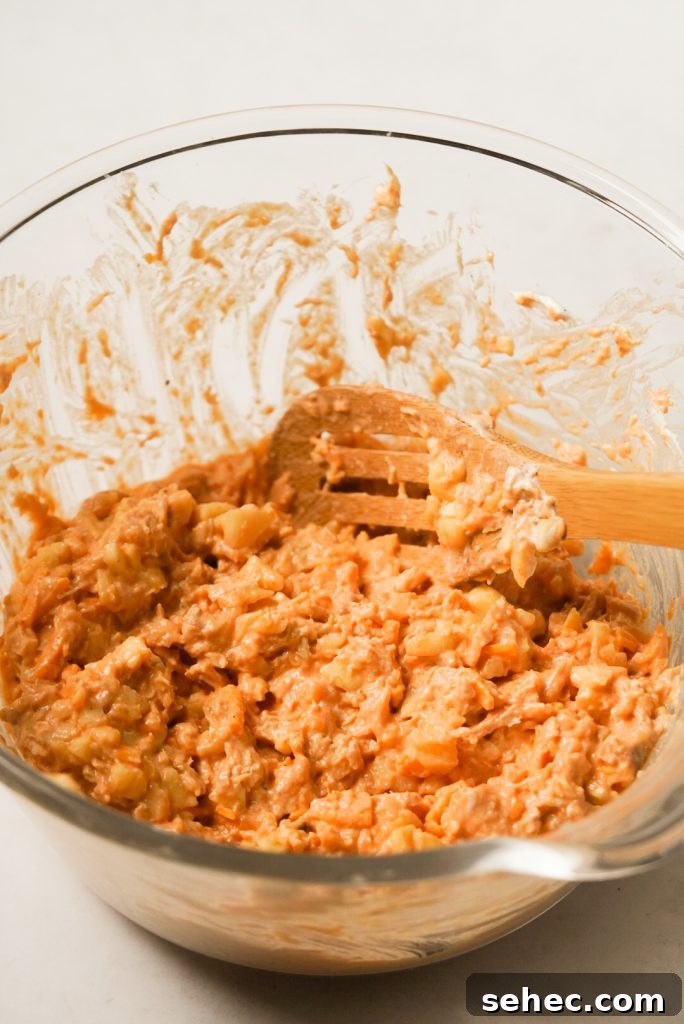 Buffalo Chicken Zucchini Boats Recipe 8 combined buffalo chicken filling in mixing bowl