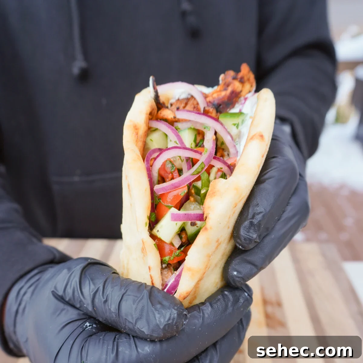 Grilled Chicken Shawarma Recipe 10 grilled chicken shawarma wrapped in a pita.