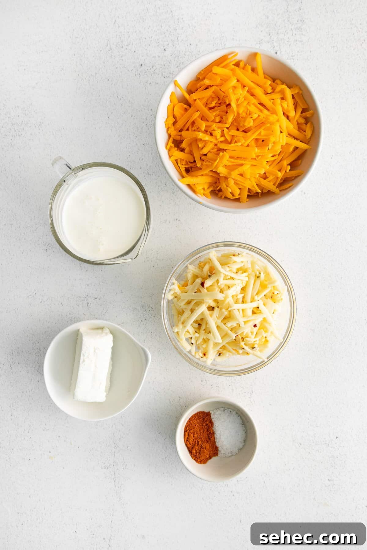 Ingredients for homemade cheese spread. Ingredients for homemade cheese spread in bowls.