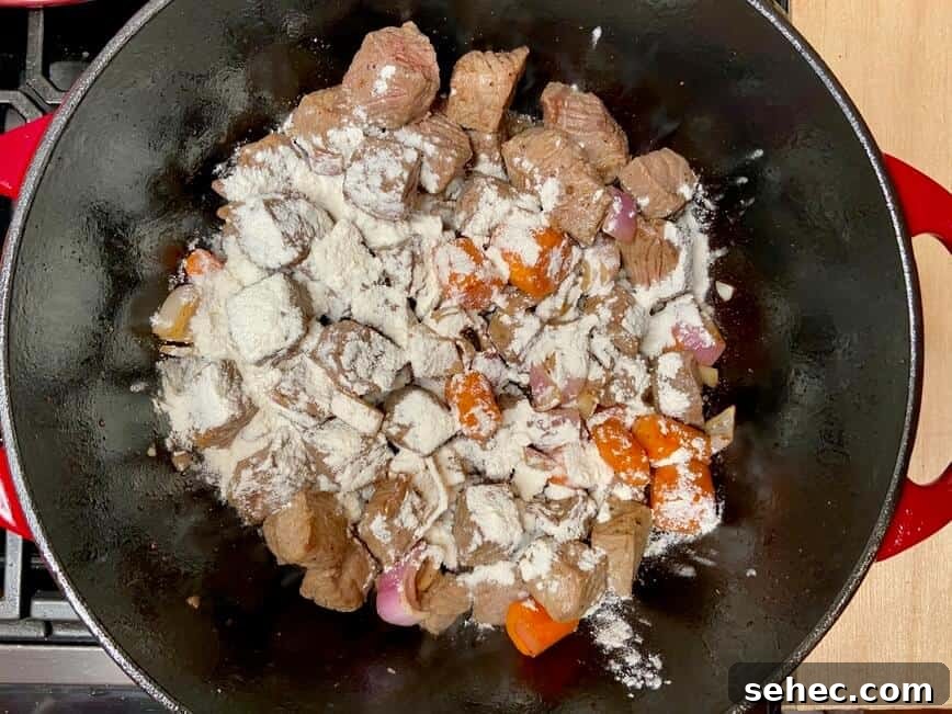Julia Child Beef Bourguignon Recipe Made Simple 11 Adding bacon, beef, and flour to the pot.