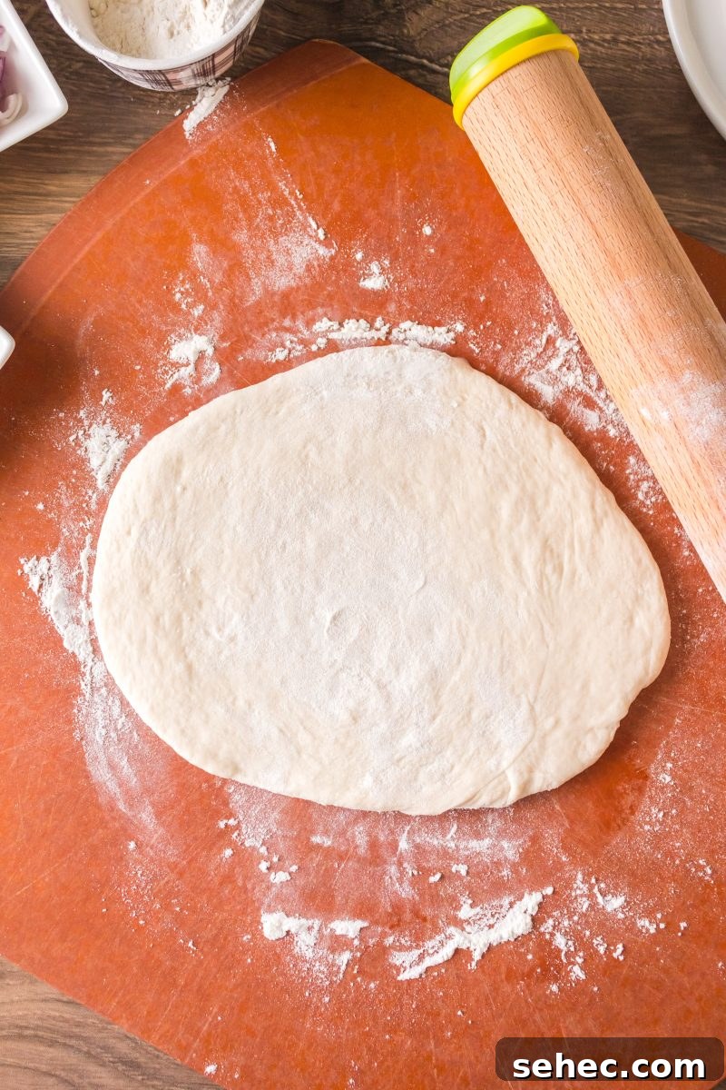 Crispy Chewy Sourdough Pizza Crust Recipe 13 A rolled homemade sourdough pizza crust