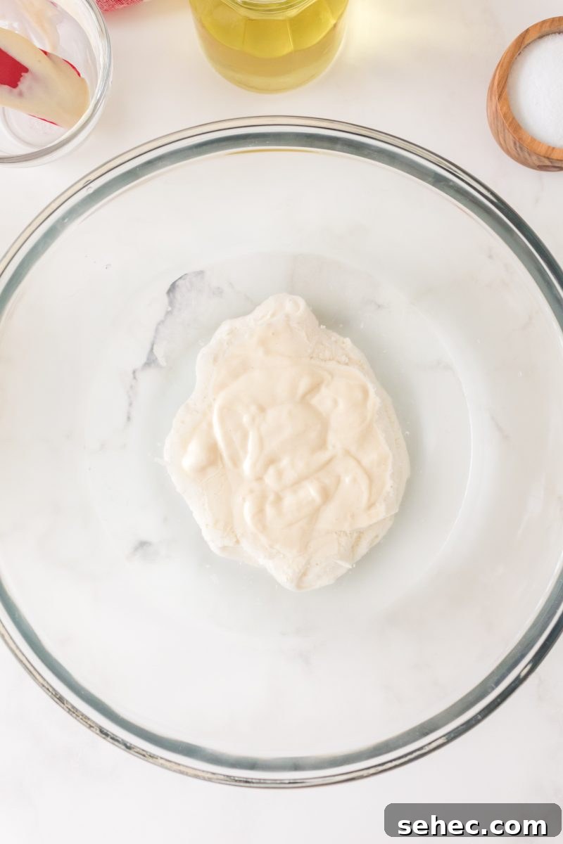 Crispy Chewy Sourdough Pizza Crust Recipe 4 Sourdough starter in a mixing bowl