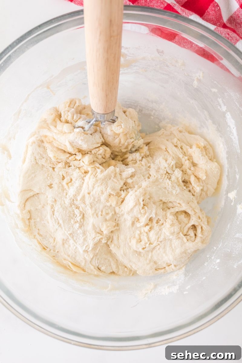 Crispy Chewy Sourdough Pizza Crust Recipe 9 Sourdough pizza crust dough in a mixing bowl