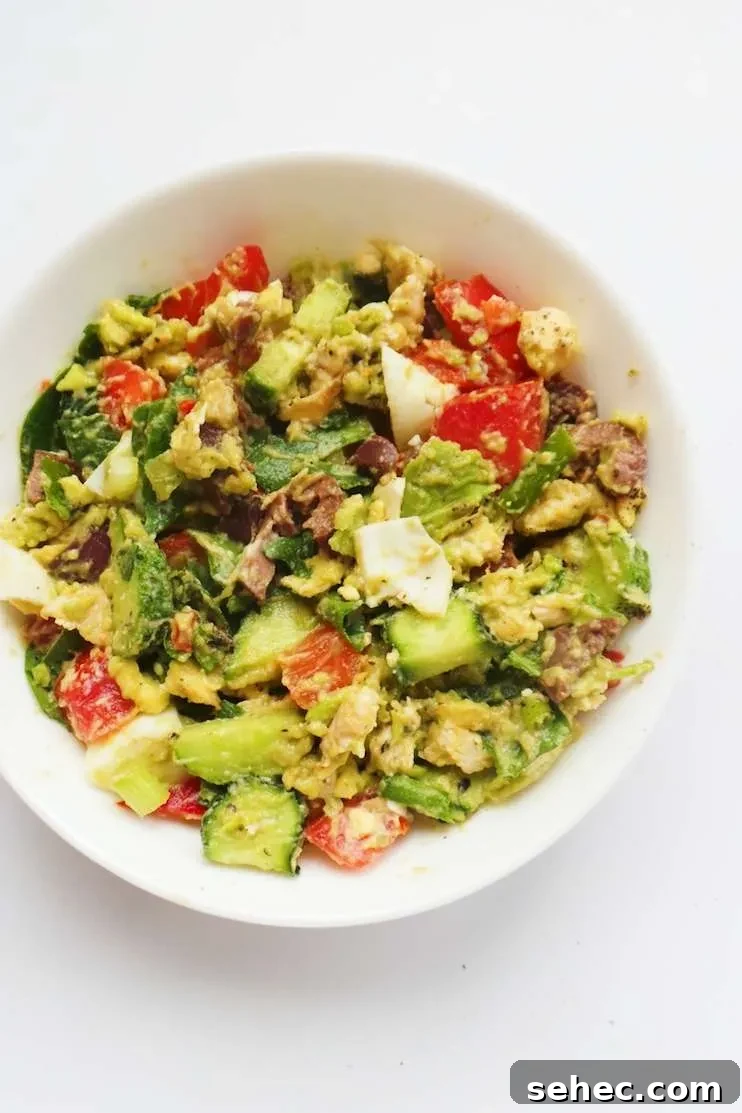 Low carb and paleo avocado chicken salad made with no mayo or sour cream, served as a fresh lunch, snack, lettuce wrap, or toast topping.