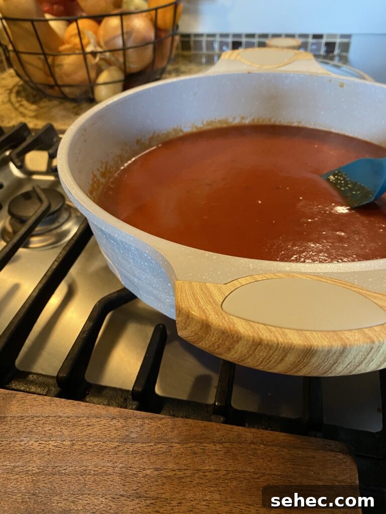 Homemade SpaghettiOs Recipe 9 Tomato sauce cooking in a pot