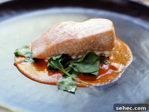 roasted red pepper salmon with spinach and tomato sauce