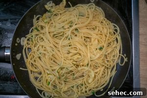 Creamy Lemon Pasta Recipe Without Cream 12 Stirring the parsley into the lemon pasta