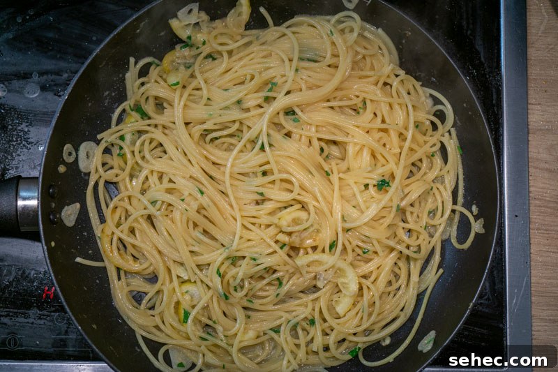 Creamy Lemon Pasta Recipe Without Cream 8 Stirring the parsley into the lemon pasta