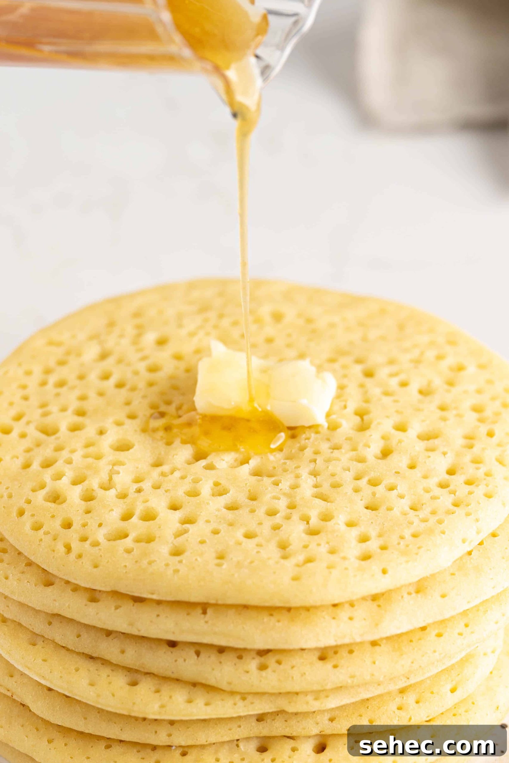 Baghrir Moroccan Semolina Pancakes with Honeycomb Holes 8 a stack of Moroccan pancakes