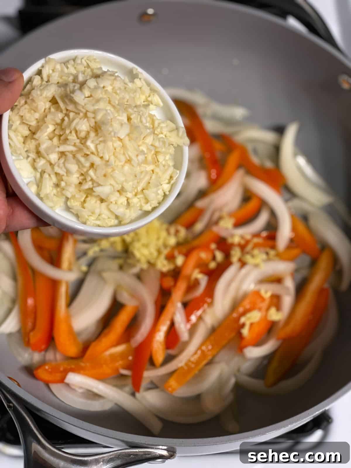 Lemon Basil Tofu Recipe with Crispy Edges 6 process of addding ginger to pan