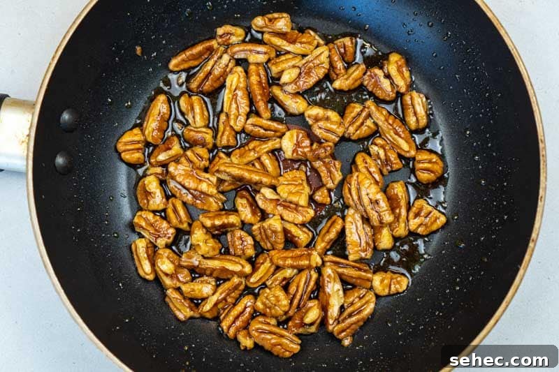 Crisp Spinach and Arugula Salad with Orange and Parmesan 4 Toasting the pecans
