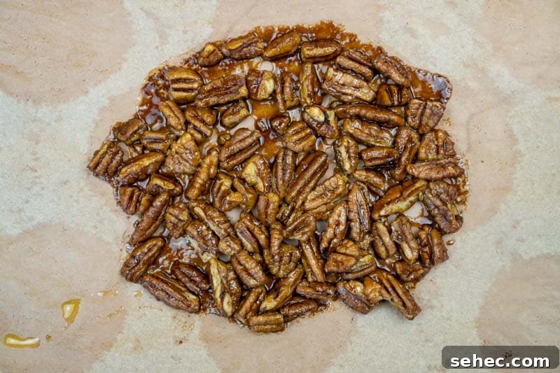Crisp Spinach and Arugula Salad with Orange and Parmesan 5 Finished candied pecans