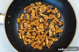 Crisp Spinach and Arugula Salad with Orange and Parmesan 9 Toasting the pecans