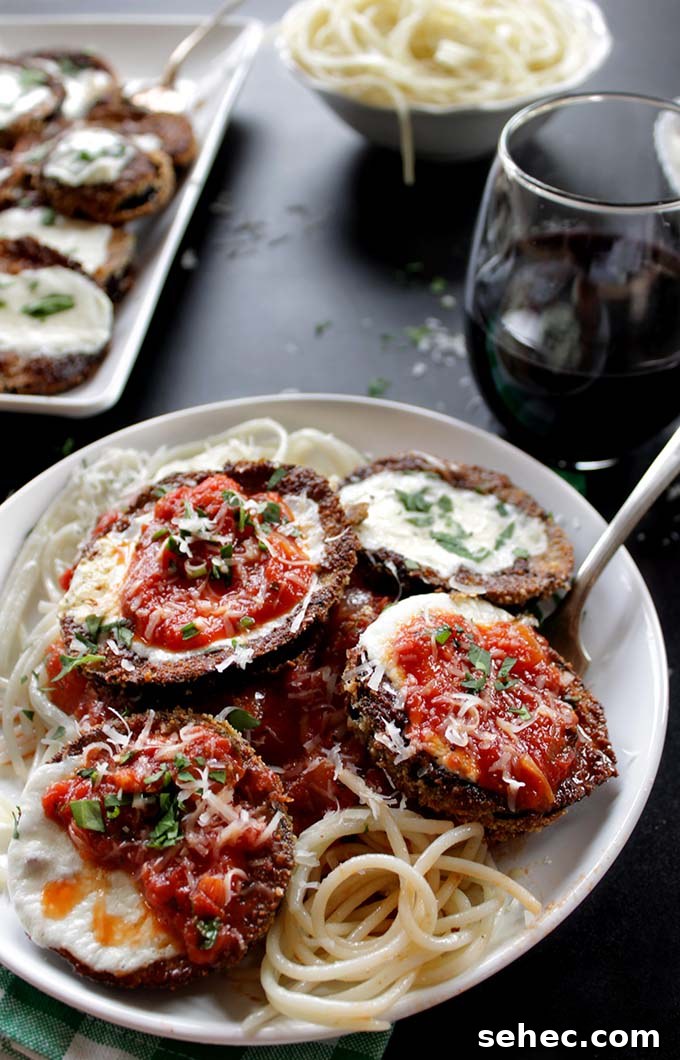 Gluten Free Eggplant Parmesan with Crispy Baked Layers 2 Gluten-free eggplant Parmesan with tomato sauce and cheese