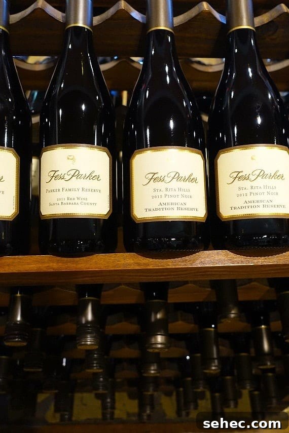 California Coastal Cruise – Santa Barbara Three bottles of Fess Parker pinot noir on a shelf