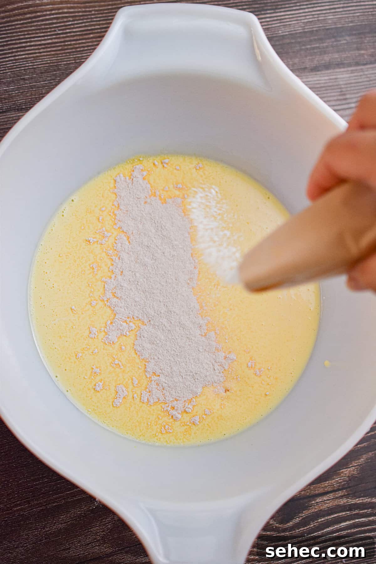 Eggnog Cream Pie Recipe for the Holidays 6 A package of vanilla pudding is sprinkled over the eggnog.