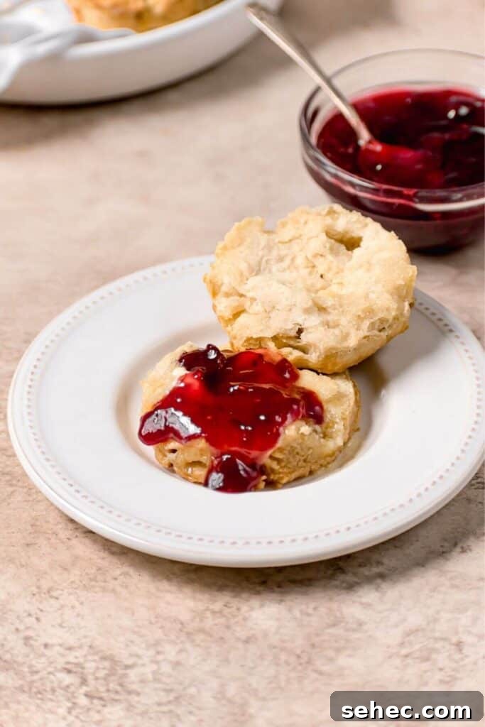 Fluffy Almond Milk Biscuits Recipe 11 fluffy almond milk biscuit cut open with jelly and butter
