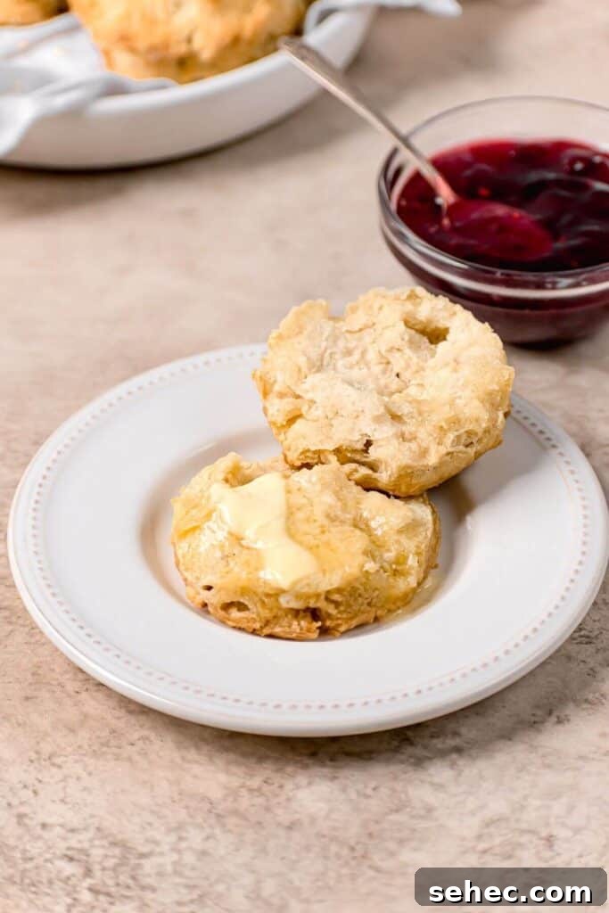 Fluffy Almond Milk Biscuits Recipe 4 fluffy buttermilk biscuit cut open with melted butter