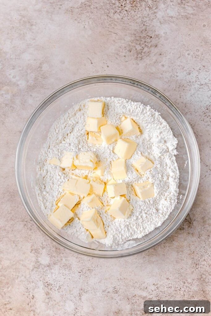 Fluffy Almond Milk Biscuits Recipe 6 cold butter cubes in flour to make fluffy biscuits