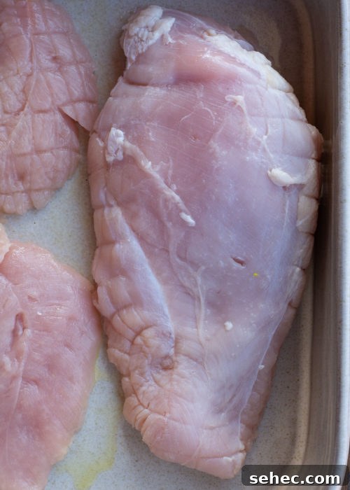 How to Cook a Juicy Turkey Breast in the Oven 5 Preparing turkey breast with herb butter