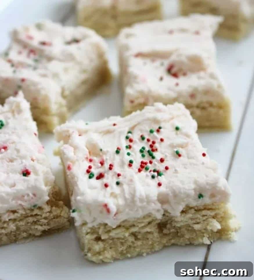 19 Big Batch Cookie Recipes for Parties and Crowds 15 Sugar cookies with white frosting and colorful sprinkles.