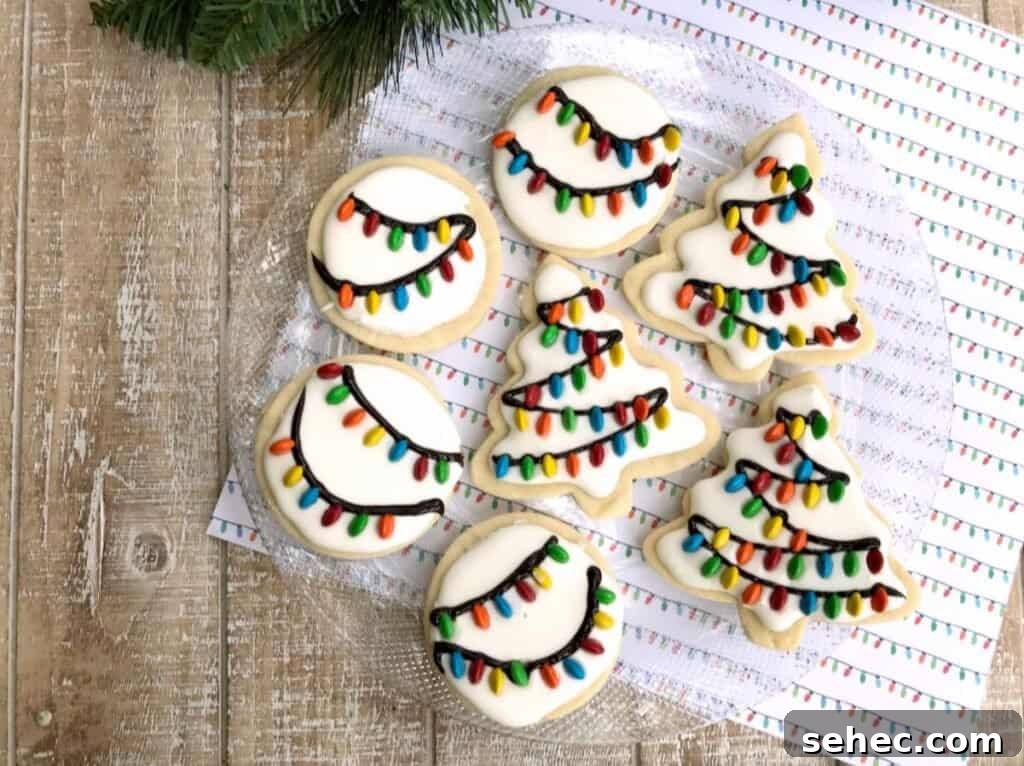 19 Big Batch Cookie Recipes for Parties and Crowds 7 Sugar cookies with Christmas light icing decorations.