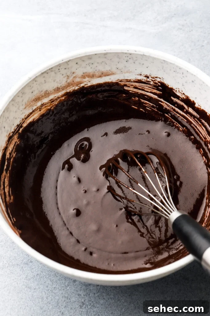Fudgy Brown Butter Brownies with Crackly Tops 7 eggs, sugar and cocoa powder whisked together