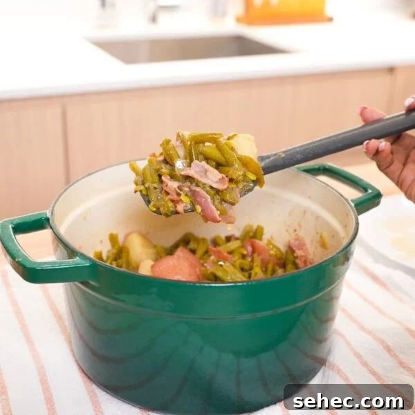 Southern Candied Yams with Brown Sugar and Butter 12 Southern green beans and red potatoes cooked with bacon in a pot with a light savory broth.