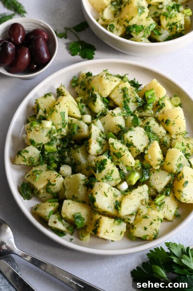 Greek Lemon Roasted Potatoes 11 A Greek potato salad made with fresh herbs and a light lemon vinaigrette.