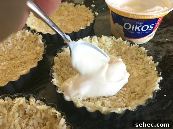 No-Bake Greek Yogurt Tart Recipe 8 Adding greek yogurt to the tart crust.