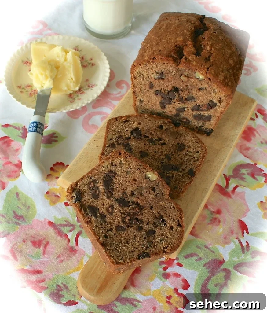 Spiced Zucchini Bread with Chocolate Chips Pecans and Raisins 2 Spicy zucchini bread with chocolate chips, pecans, and golden raisins