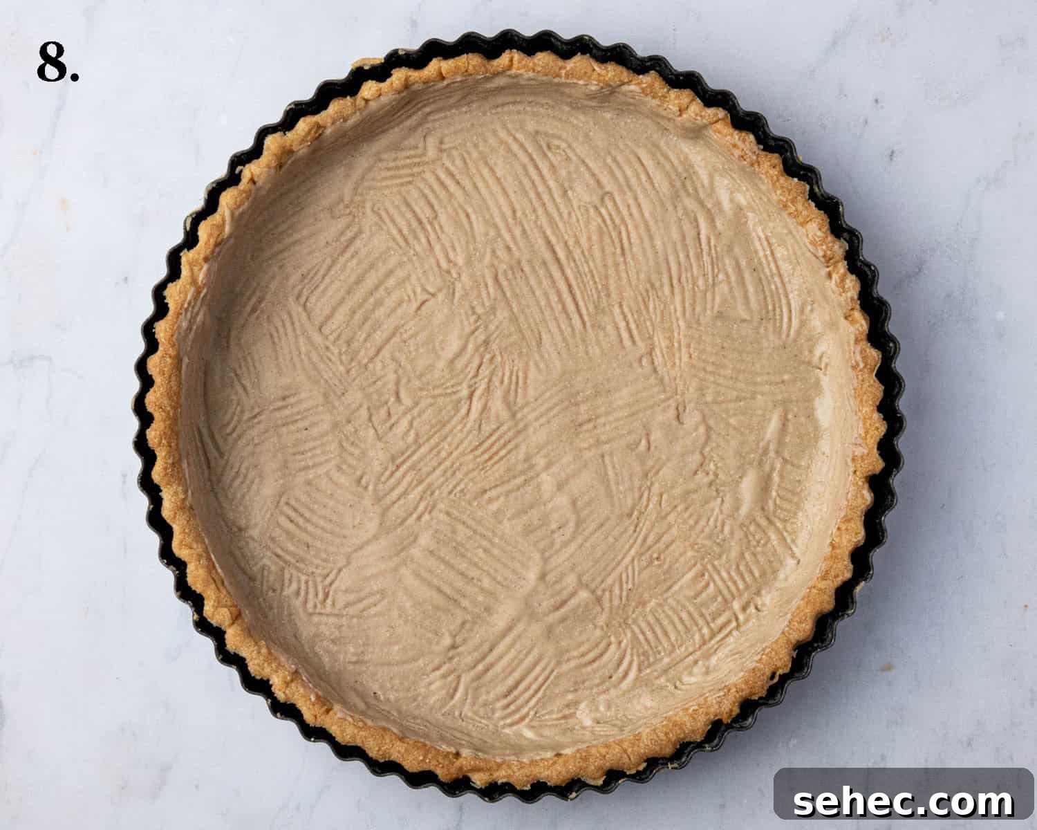 Vegan Caramelized Pineapple Coconut Tart 12 Pastry case brushed with white chocolate.