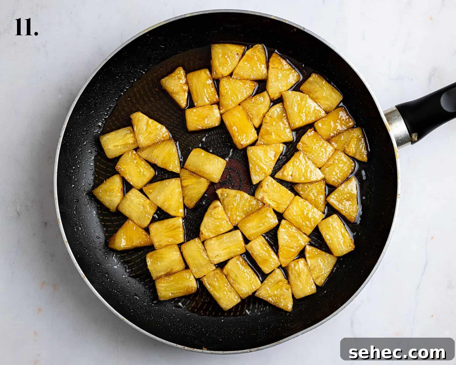 Vegan Caramelized Pineapple Coconut Tart 15 Caramelised pineapple with syrup cooked down in the pan.